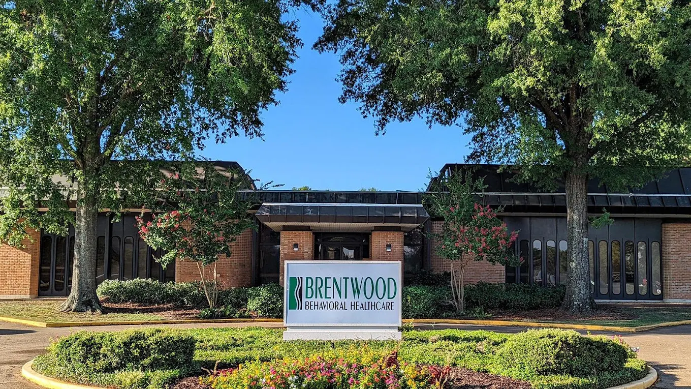 Brentwood facility exterior with landscaped entrance and sign