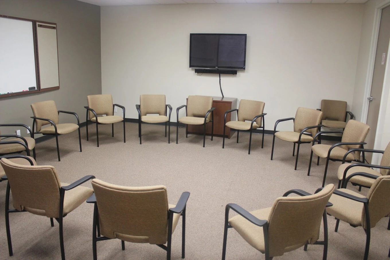 Group therapy room with chairs arranged in a circle
