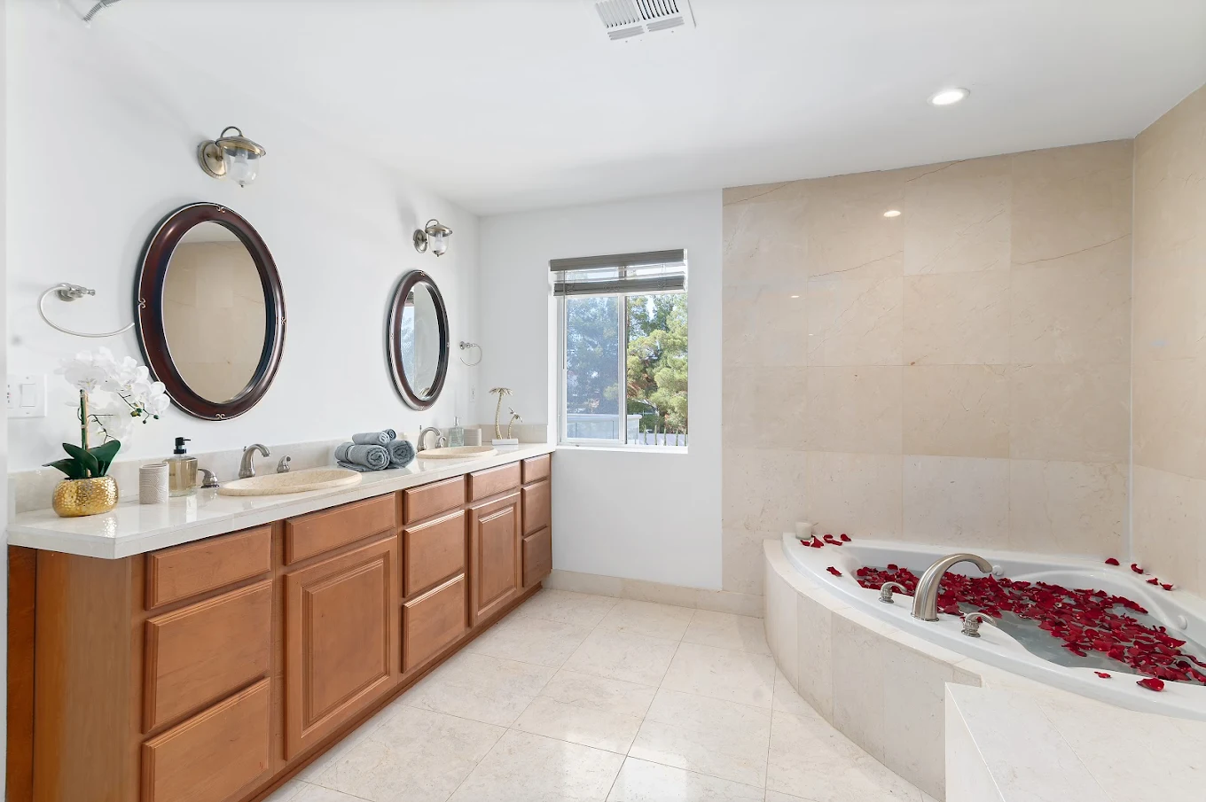 Modern bathroom with dual sinks and soaking tub