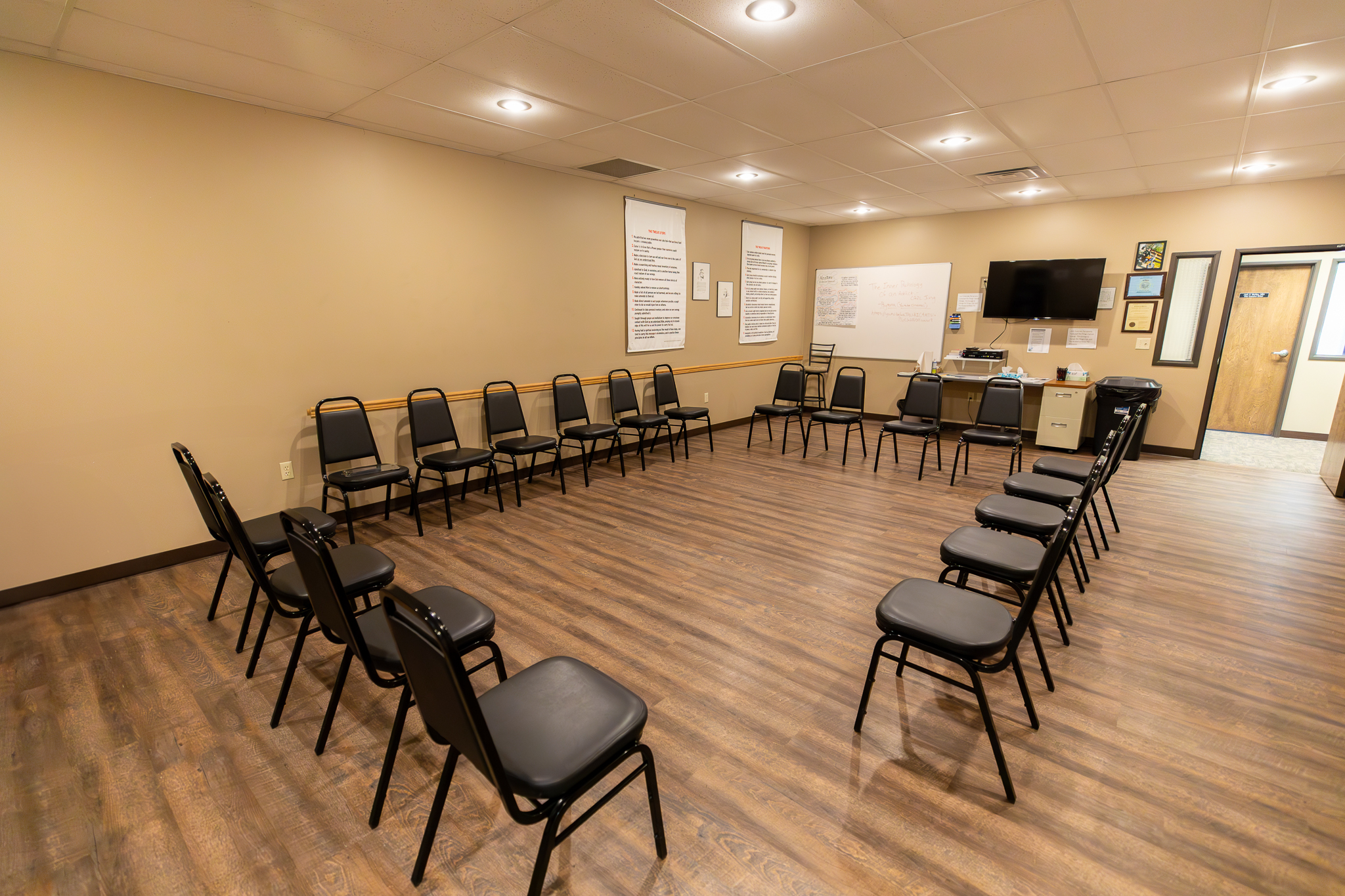 Group room with chairs arranged in a large circle