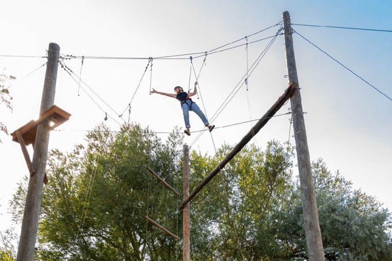 Person completing ropes course at Ascend Recovery Utah