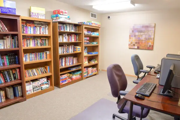 Rehab library with books, games, and computers for residents