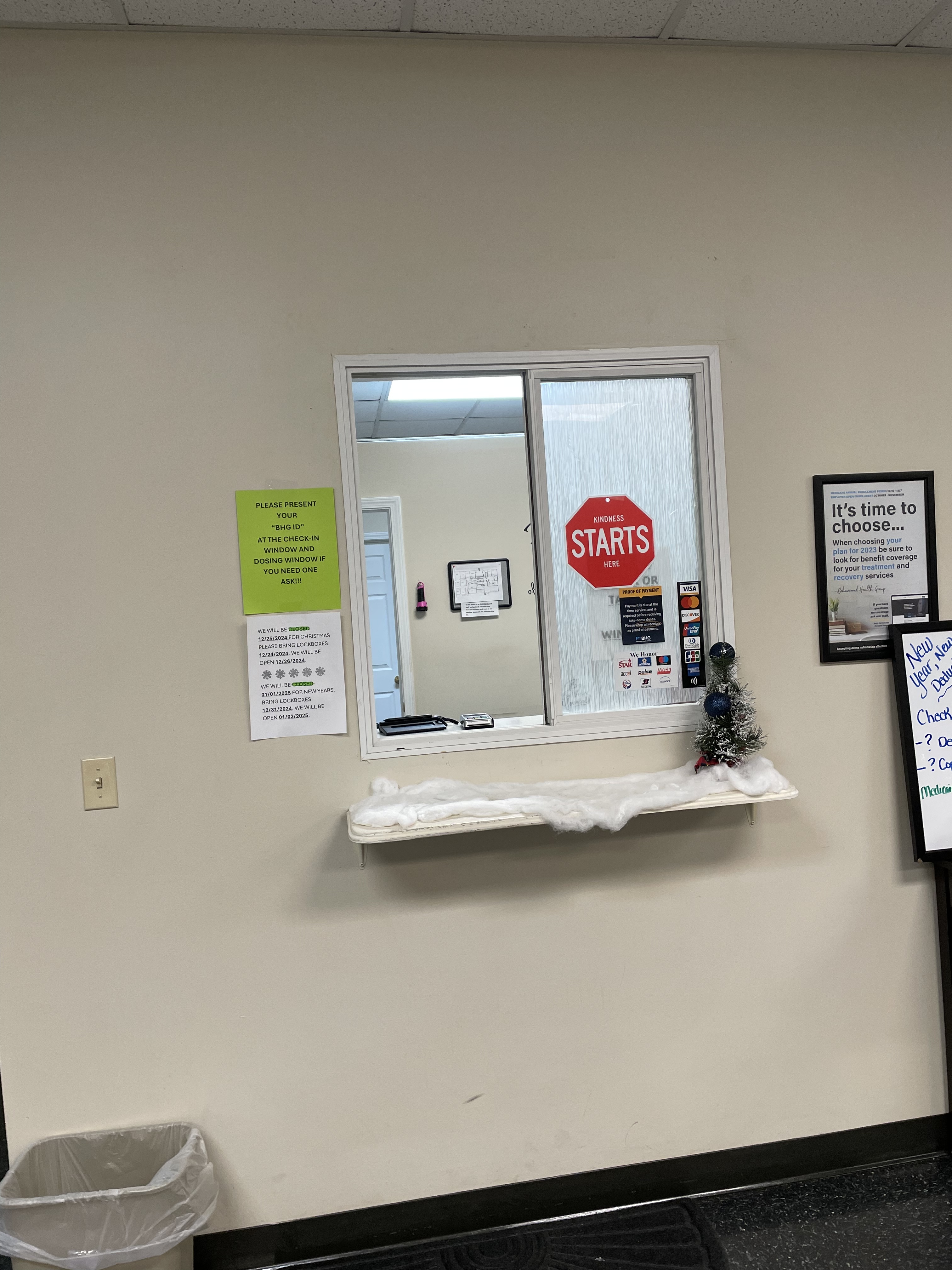 Patient check-in window inside the treatment center