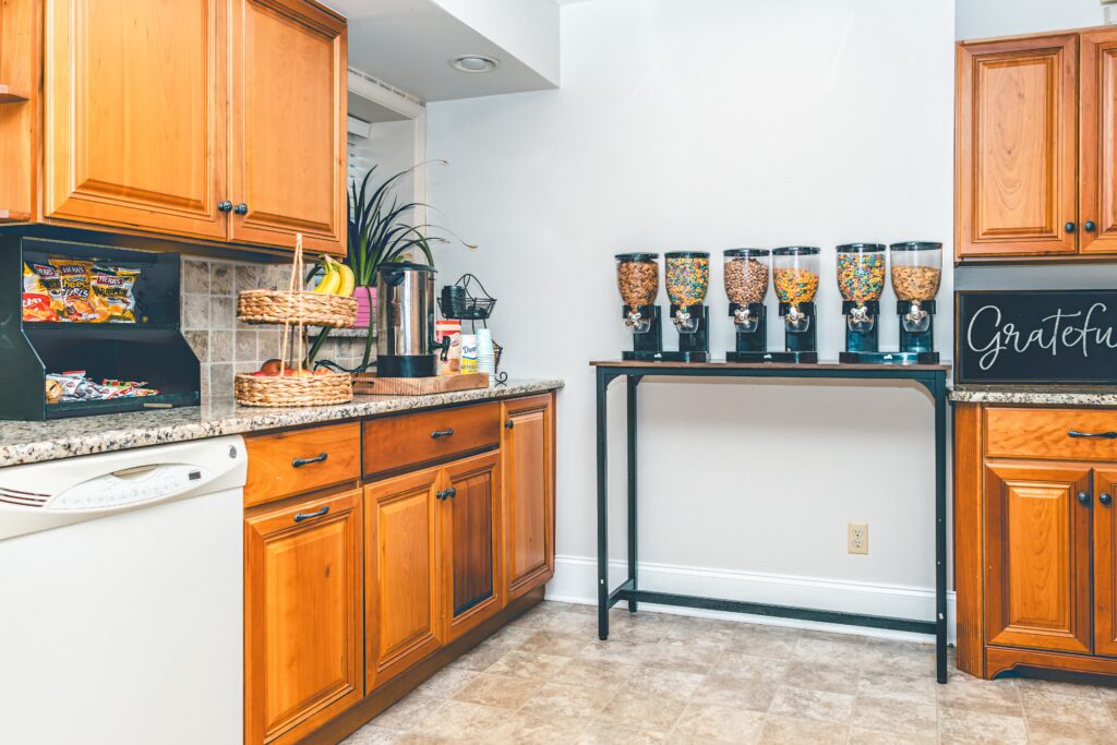 Cereal dispensers and snacks on granite counters