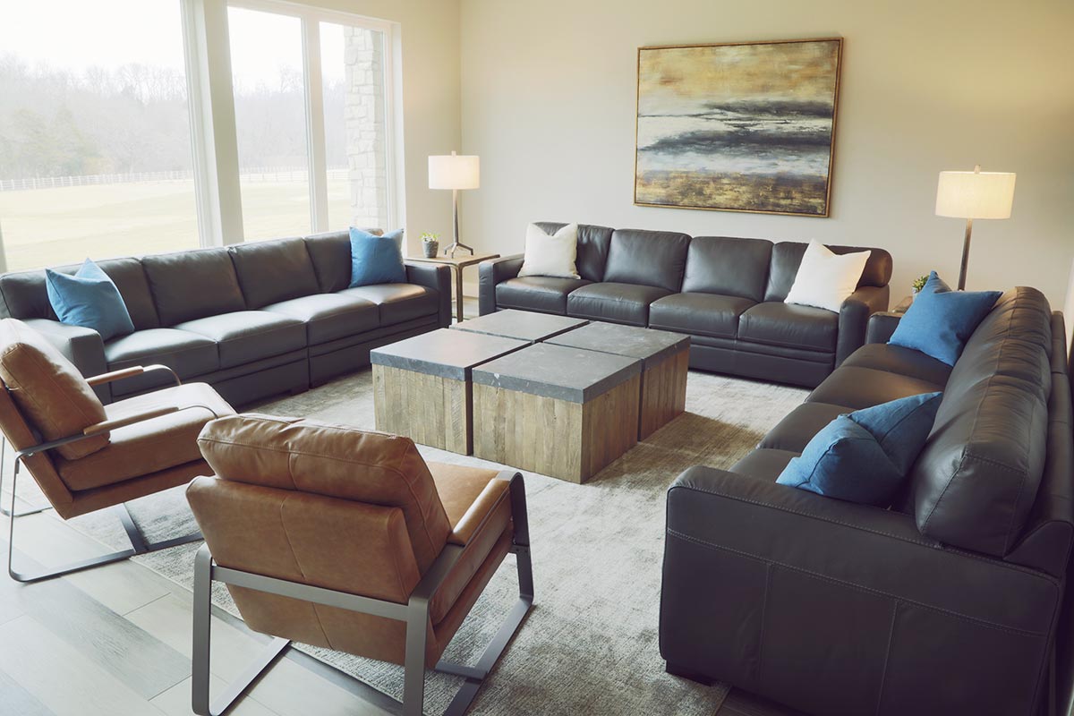 Group lounge with sofas arranged for discussion sessions