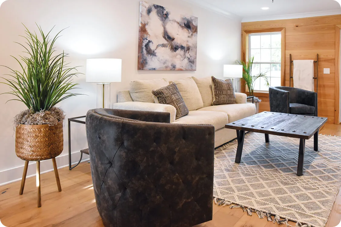 Cozy lounge with armchairs and artwork