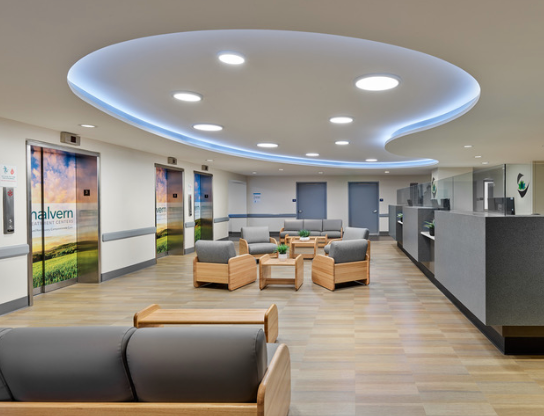 Modern lobby with seating and decorative lighting