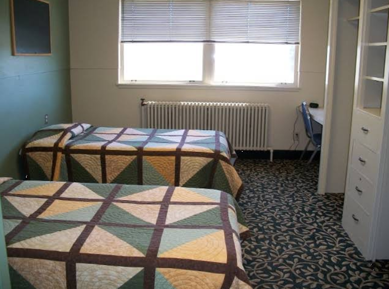 Two twin beds in a shared recovery bedroom