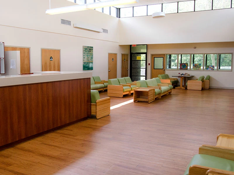 Lobby and reception area with seating and front desk