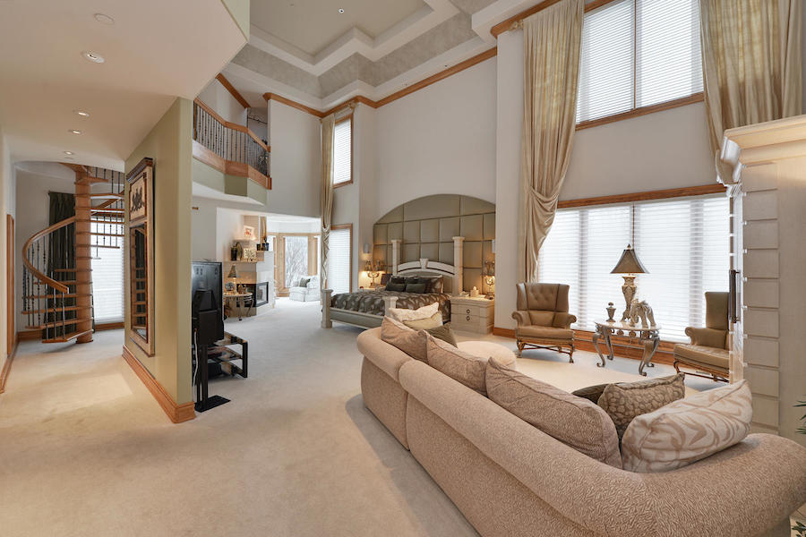 Spacious suite with seating area and high ceilings