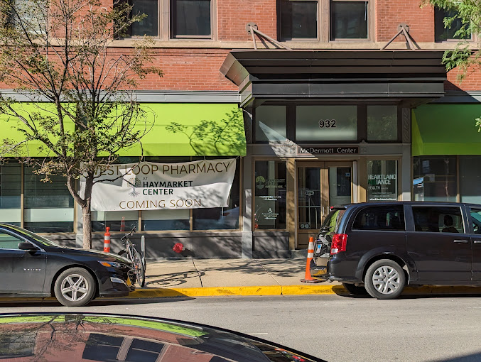 Glass door entrance with McDermott Center sig