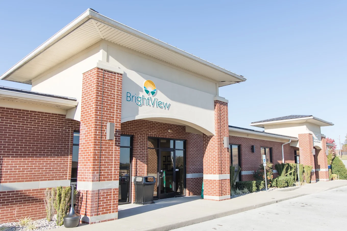 Exterior entrance of BrightView Health Somerset in a red-brick medical building with BrightView signage above the doorway