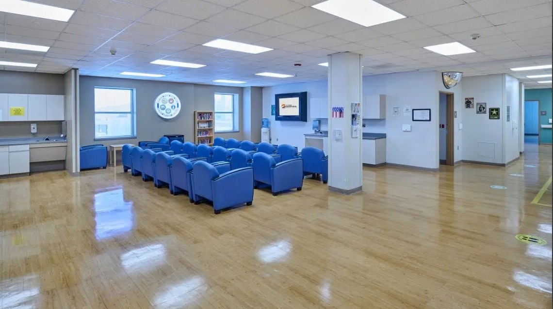 Day room with lounge chairs and TV