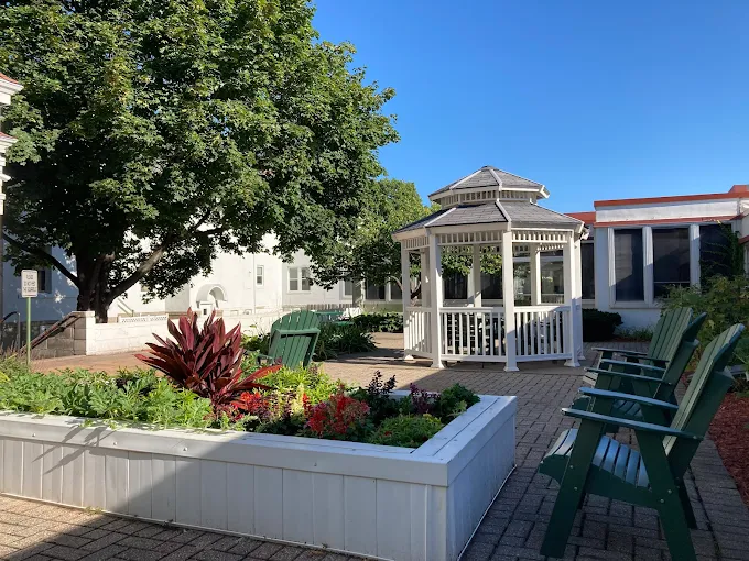Outdoor courtyard with gazebo and seating area