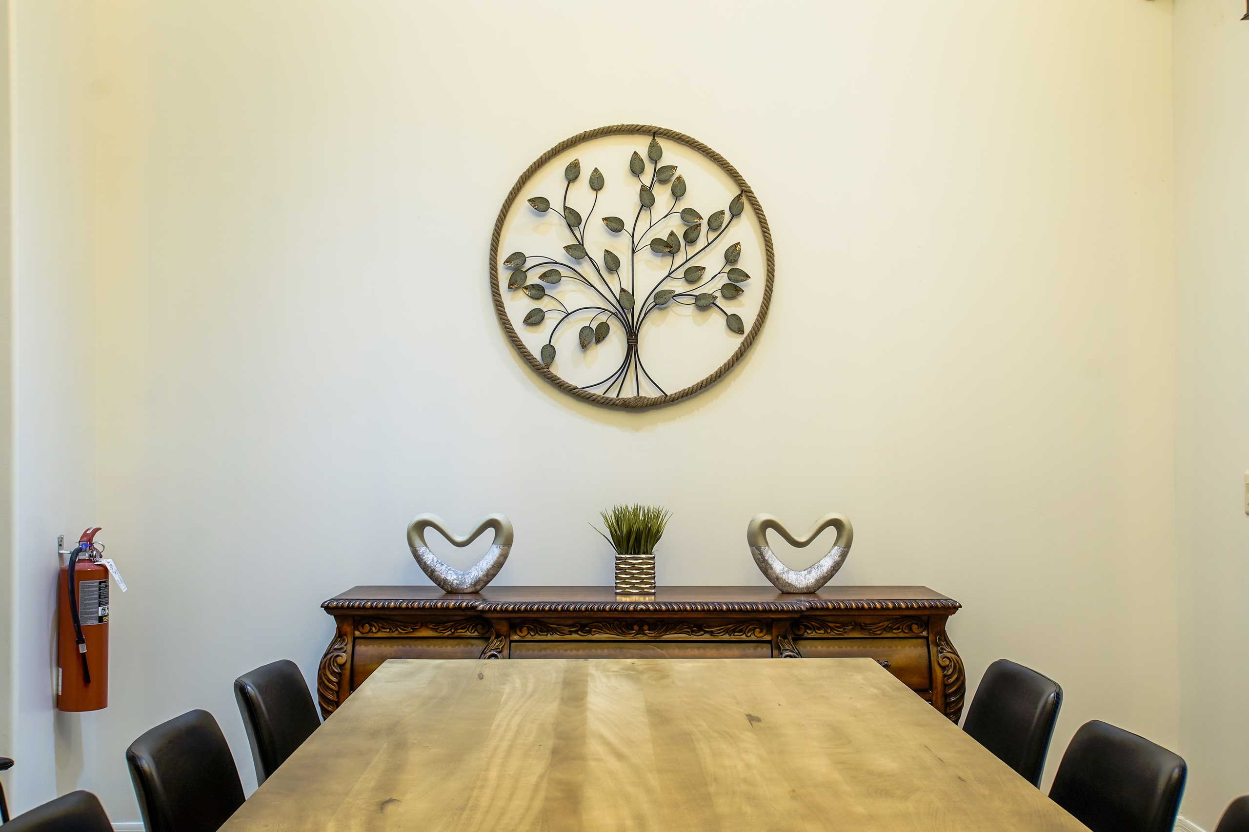 Dining table and kitchen area used for shared meals