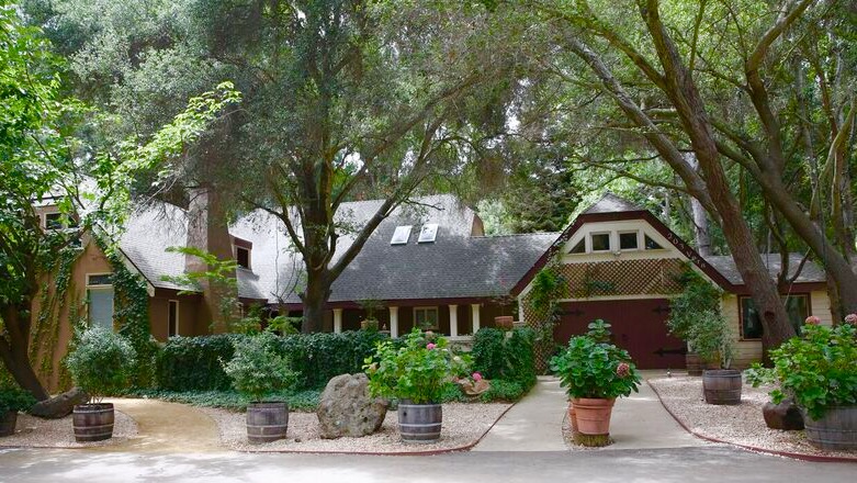 Tree-lined exterior of the Milestones Ranch Malibu residence