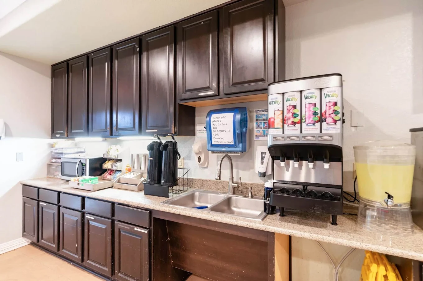 Coffee and beverage station in shared kitchen area