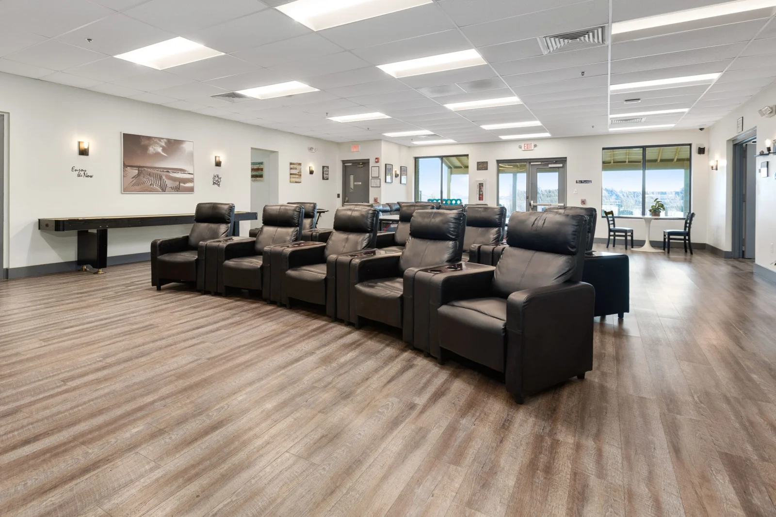 Lounge with black chairs in open space