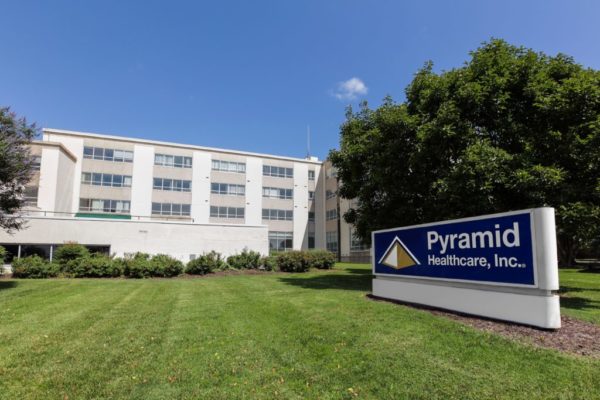 Facility building with Pyramid Healthcare sign in front