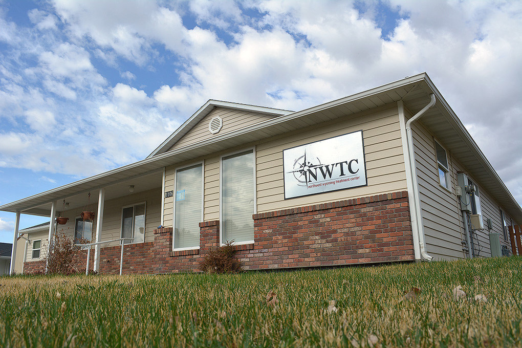 Exterior of treatment center with NWTC sign under blue sky