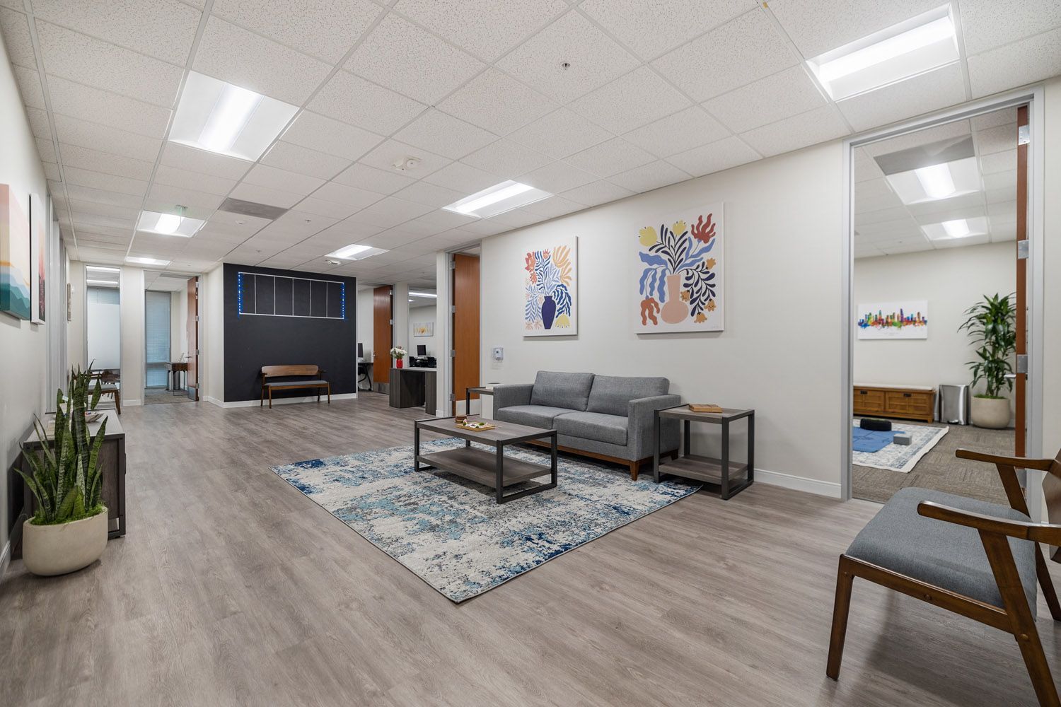 Lobby with sofa, chairs, and coffee table