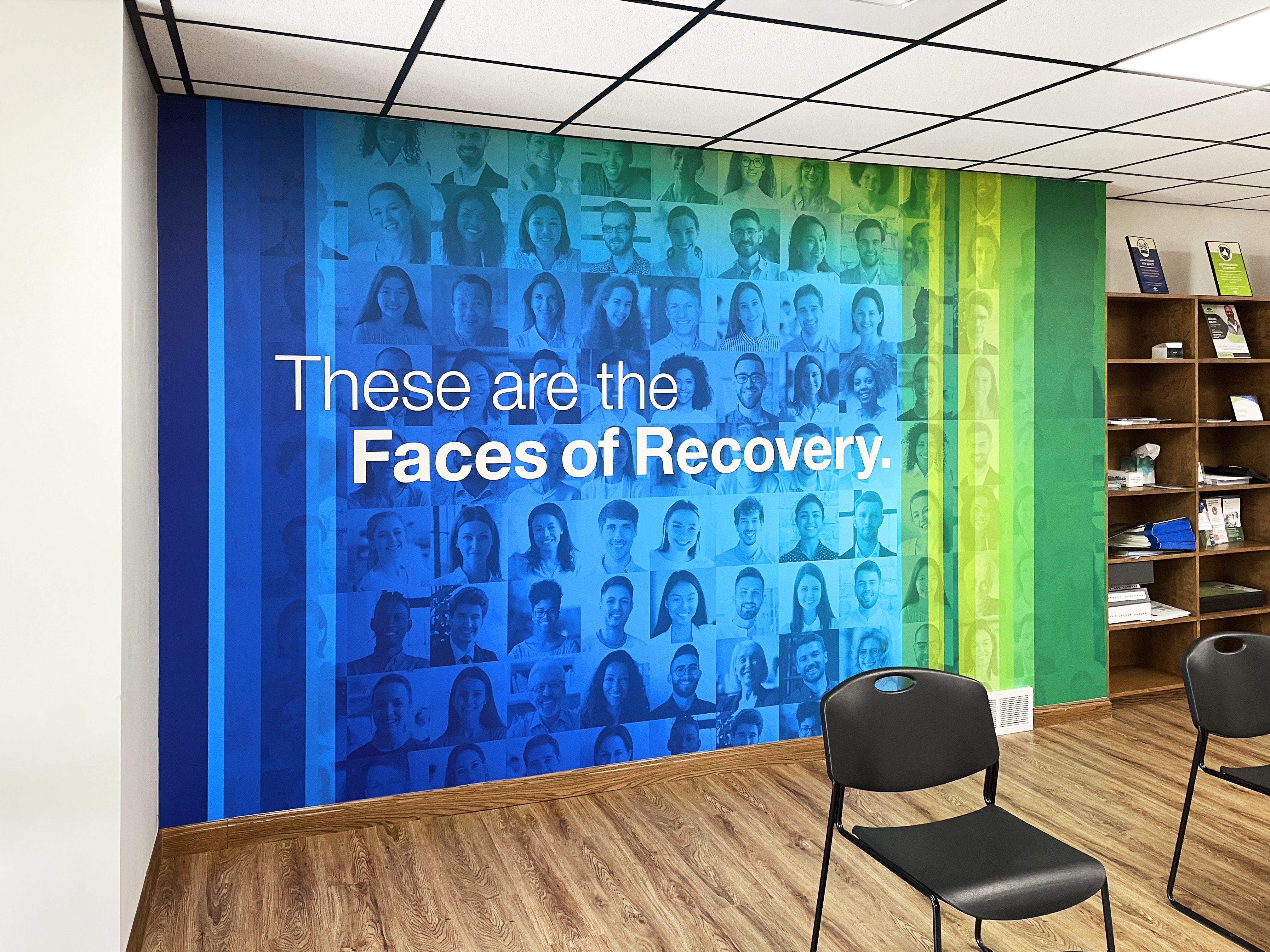 Recovery mural with photos and motivational message