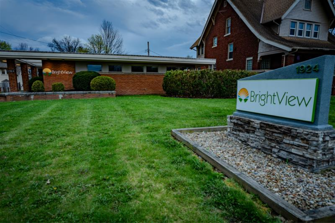 BrightView facility and sign beside a landscaped lawn