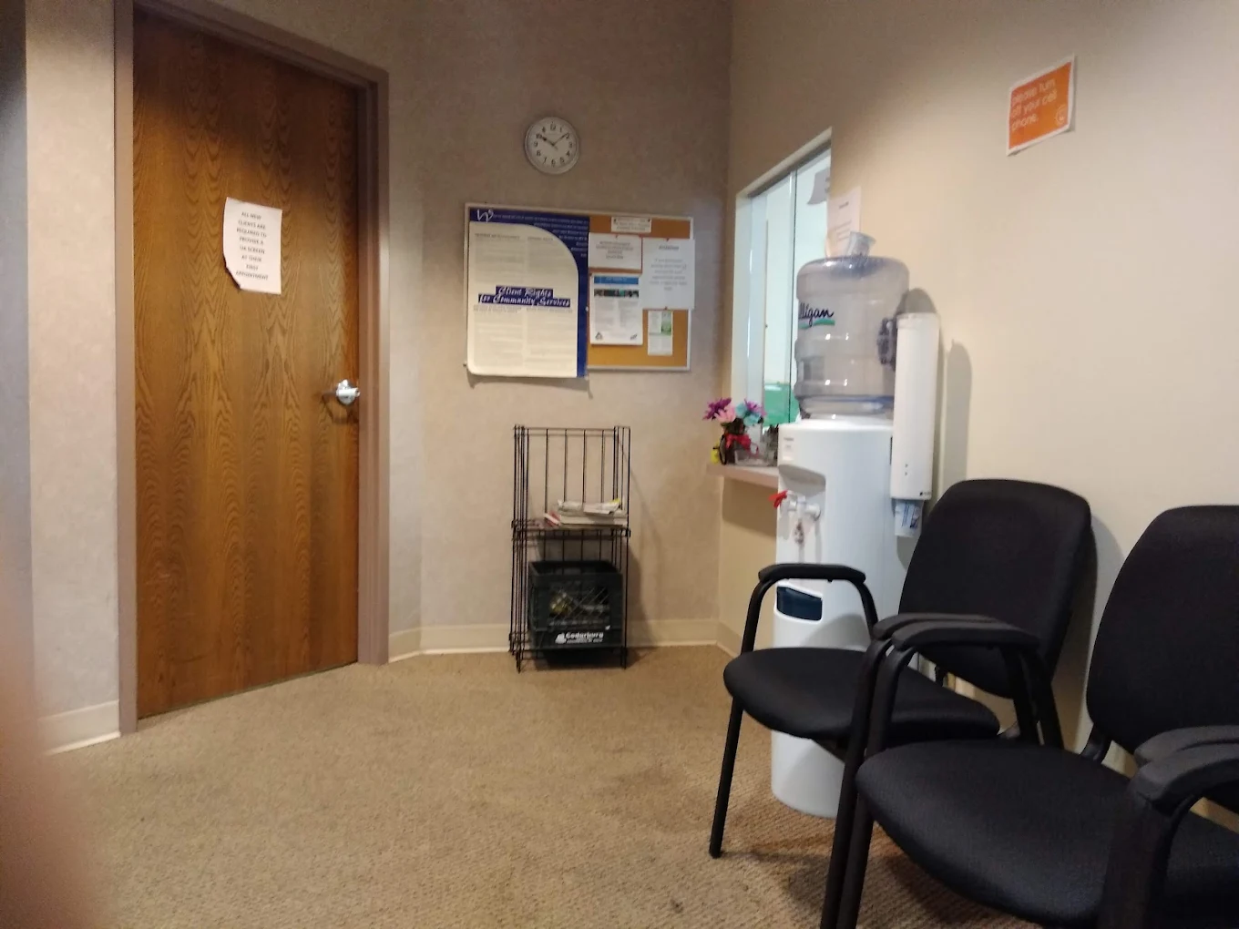 Reception room with chairs and water dispenser