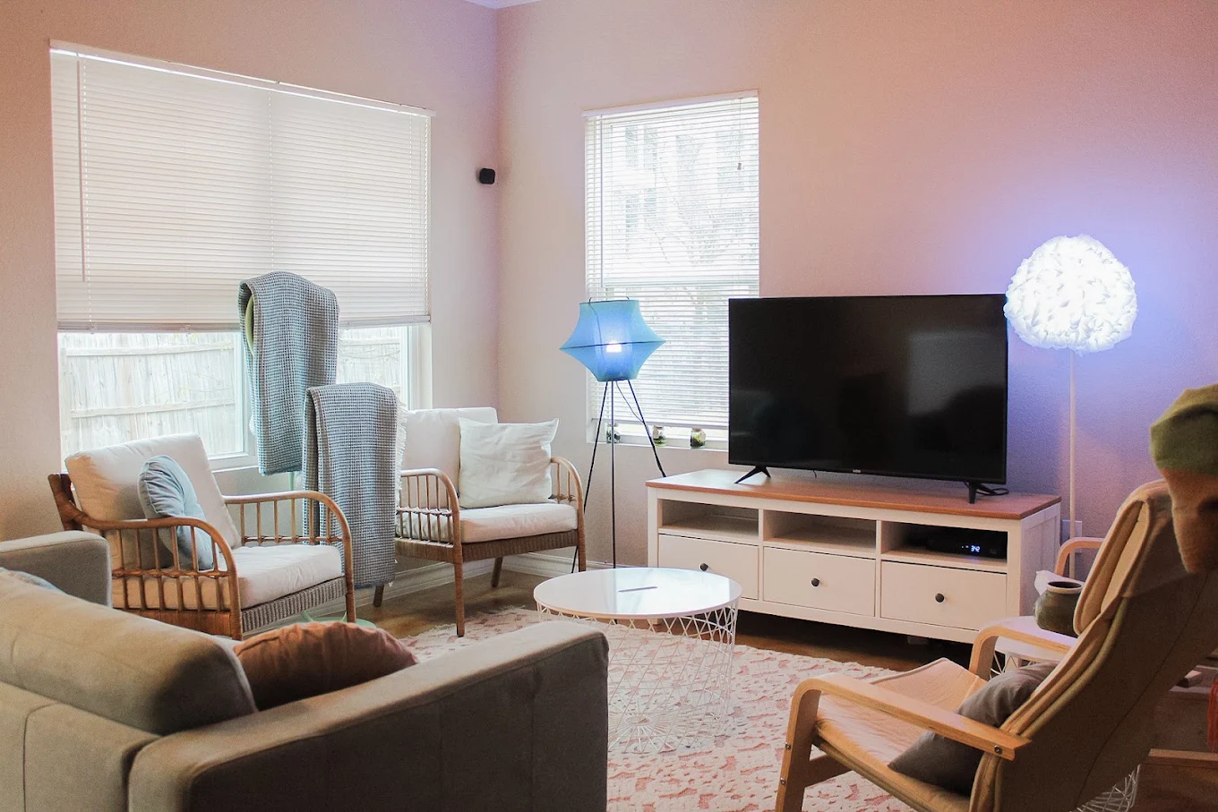 Common room with TV, seating, and coffee table