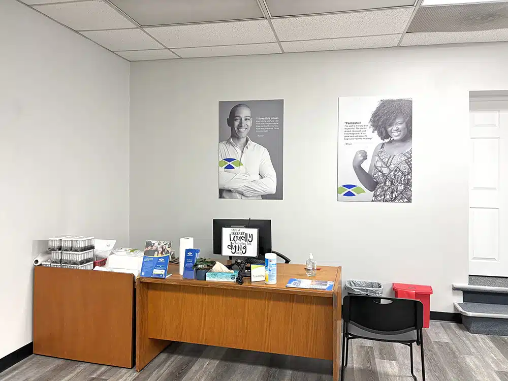 Reception desk with office supplies and check-in area