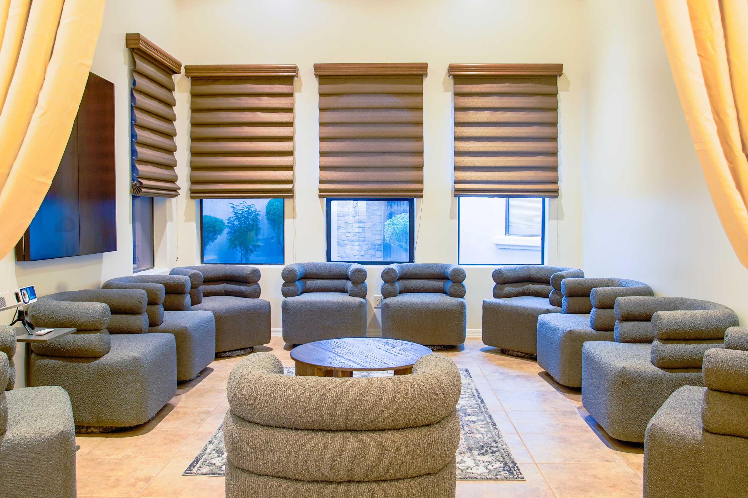 Group therapy room with circle seating for teen counseling