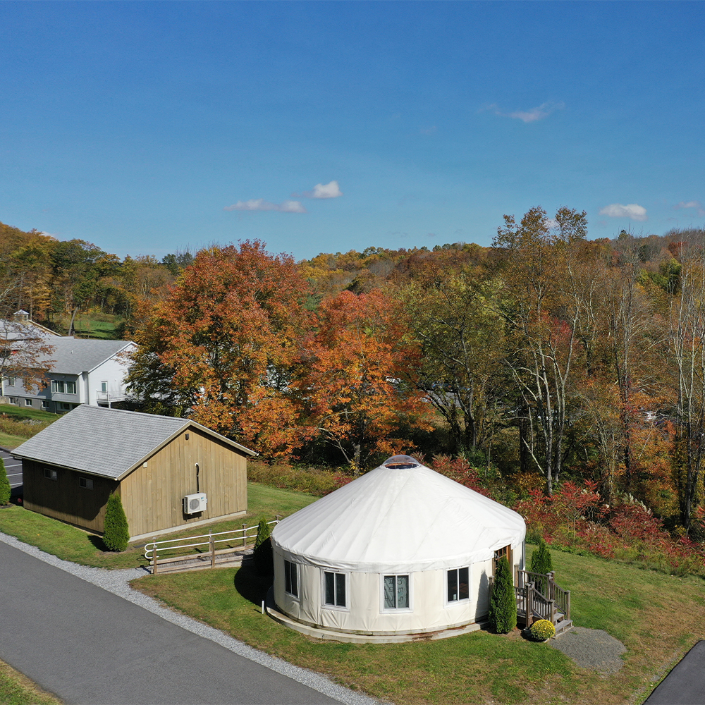 Facility outdoor buildings along driveway.