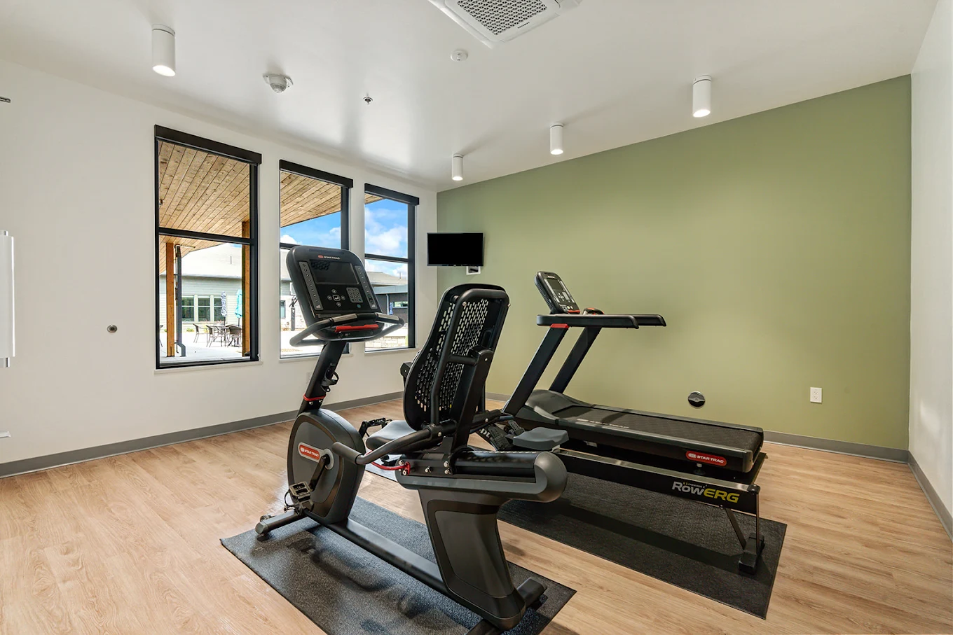 Fitness room with treadmill and exercise equipment
