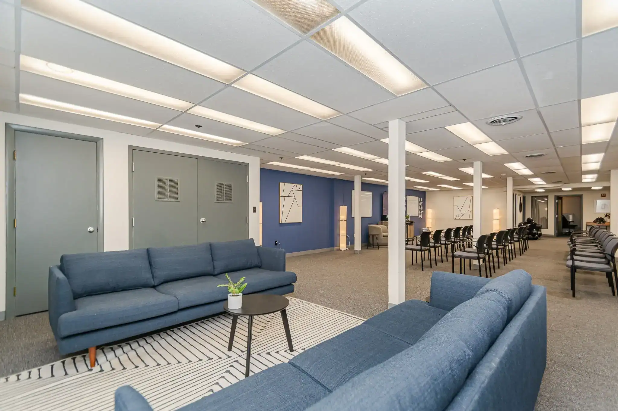 Open lounge area with couches and group seating