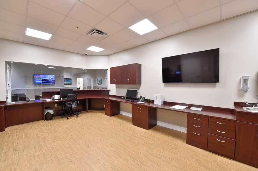  Nurse station with long desk and TV screen