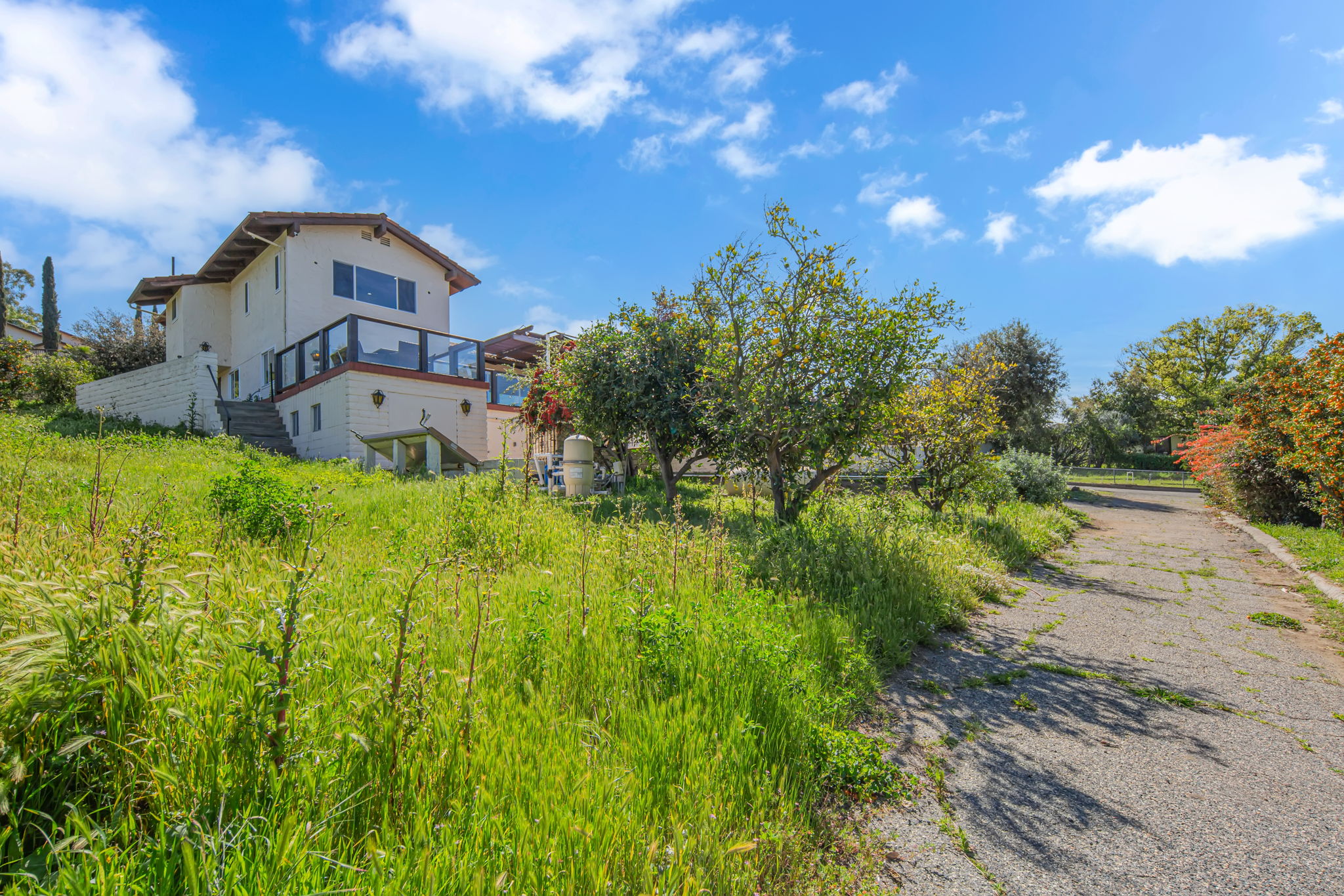 View of facility exterior from grassy hill