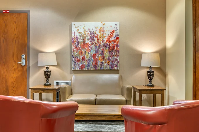 Seating area with sofa and armchairs