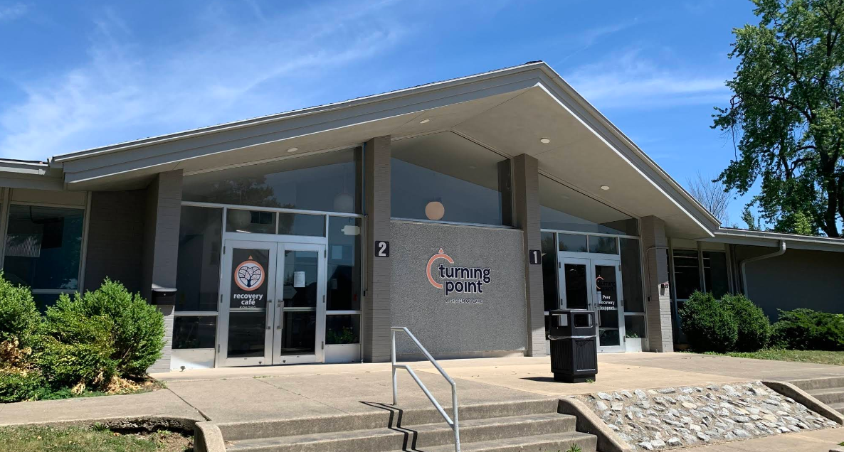 :Front entrance of Turning Point recovery center with glass doors
