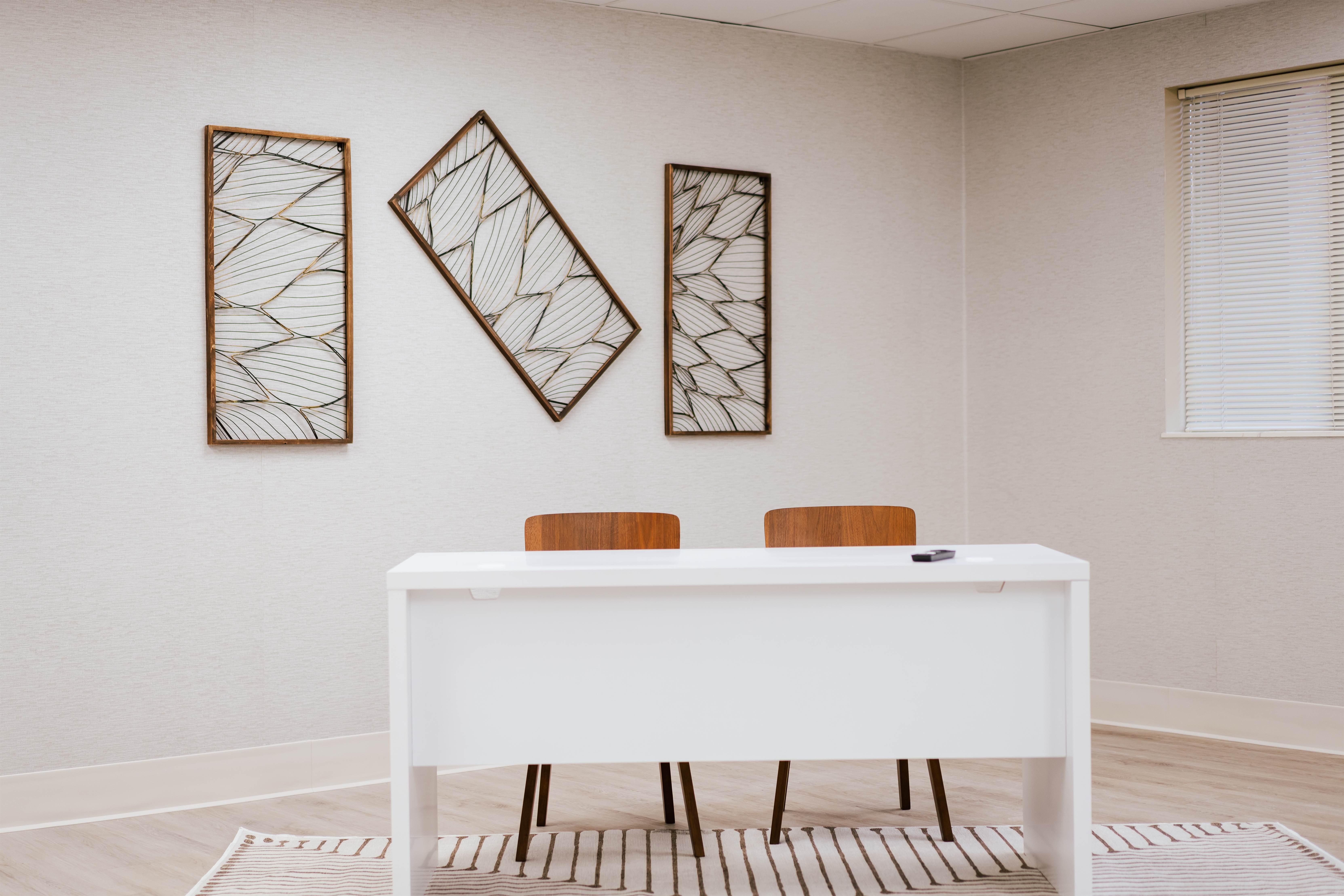 Private consultation room with table and chairs