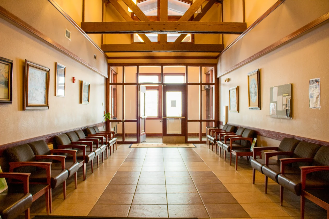 Hallway meeting area with rows of chairs