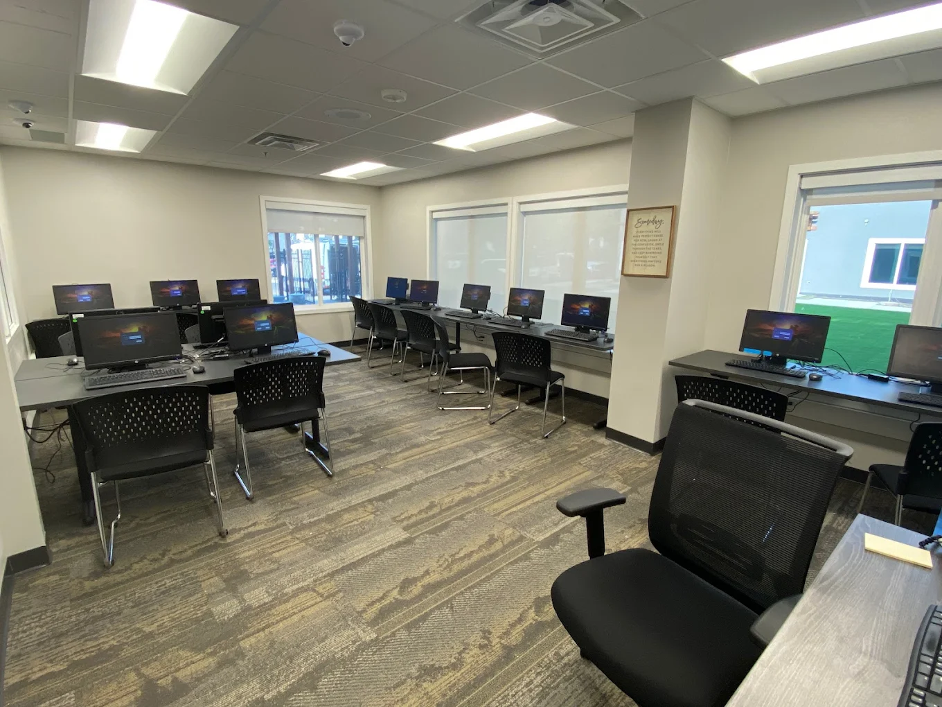 Computer lab with desktop workstations for residents