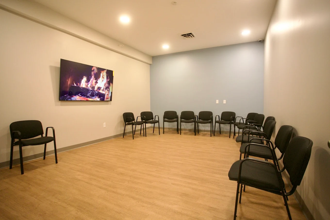 Group therapy room with chairs arranged in a circle