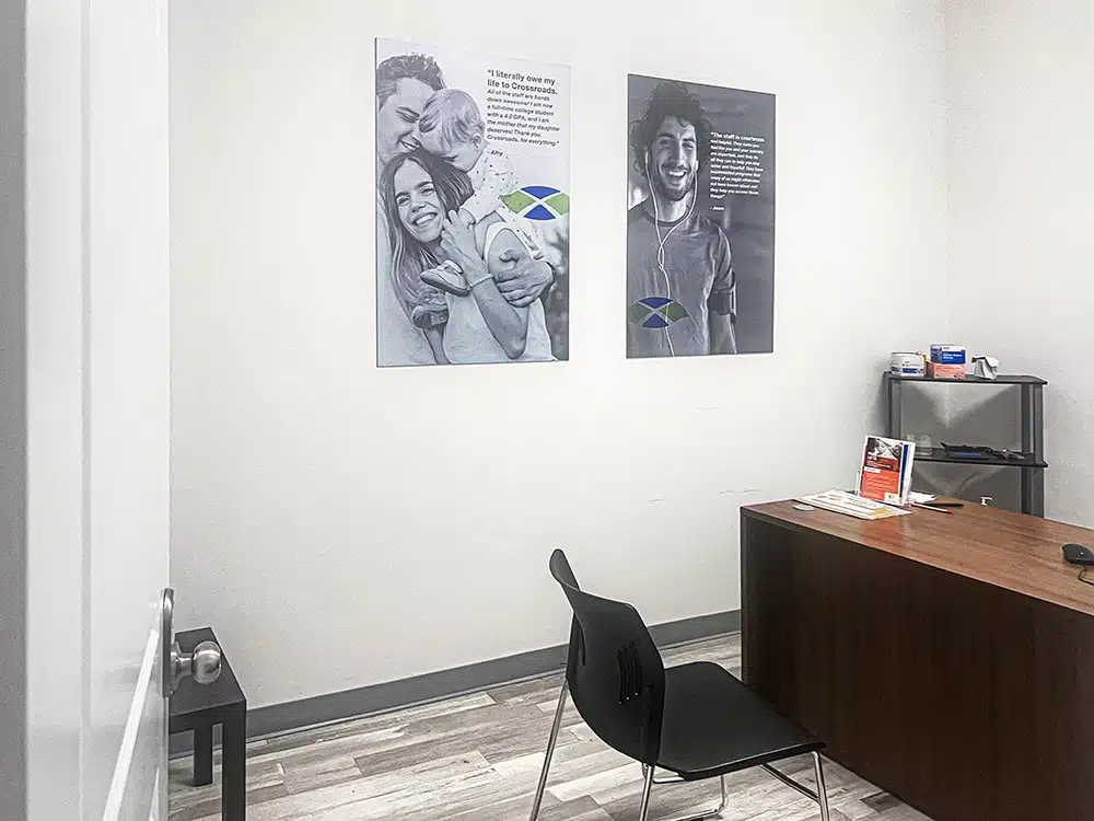 Private consultation room with desk and chair