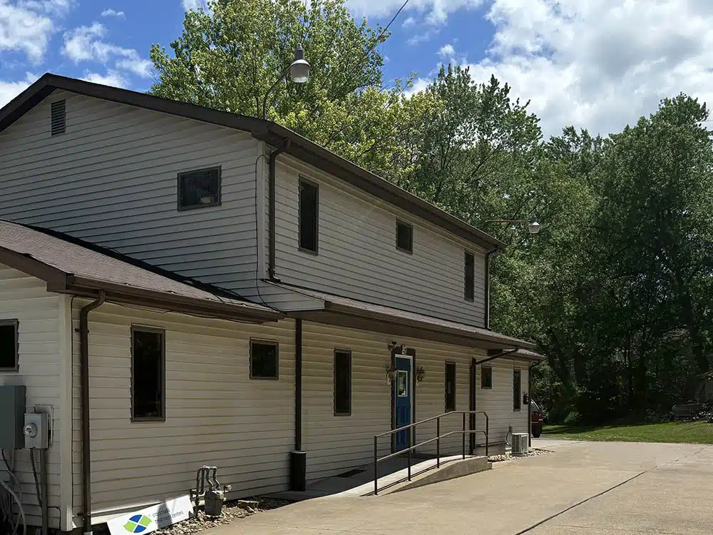 Crossroads treatment center exterior with ramp and parking area