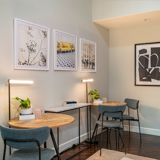 Lounge with tables and chairs.