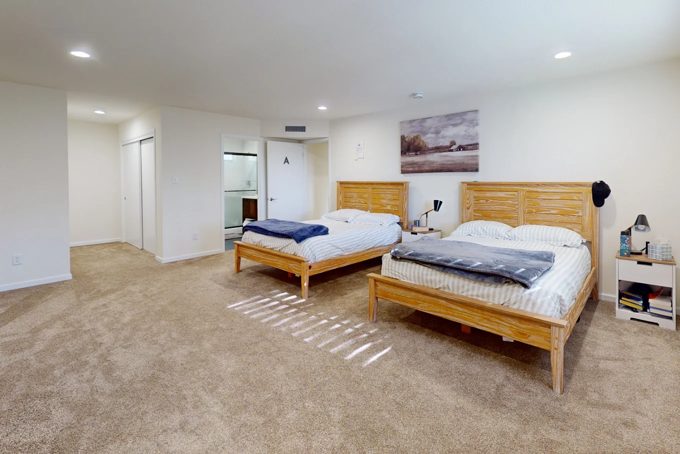 Two beds in spacious carpeted shared room