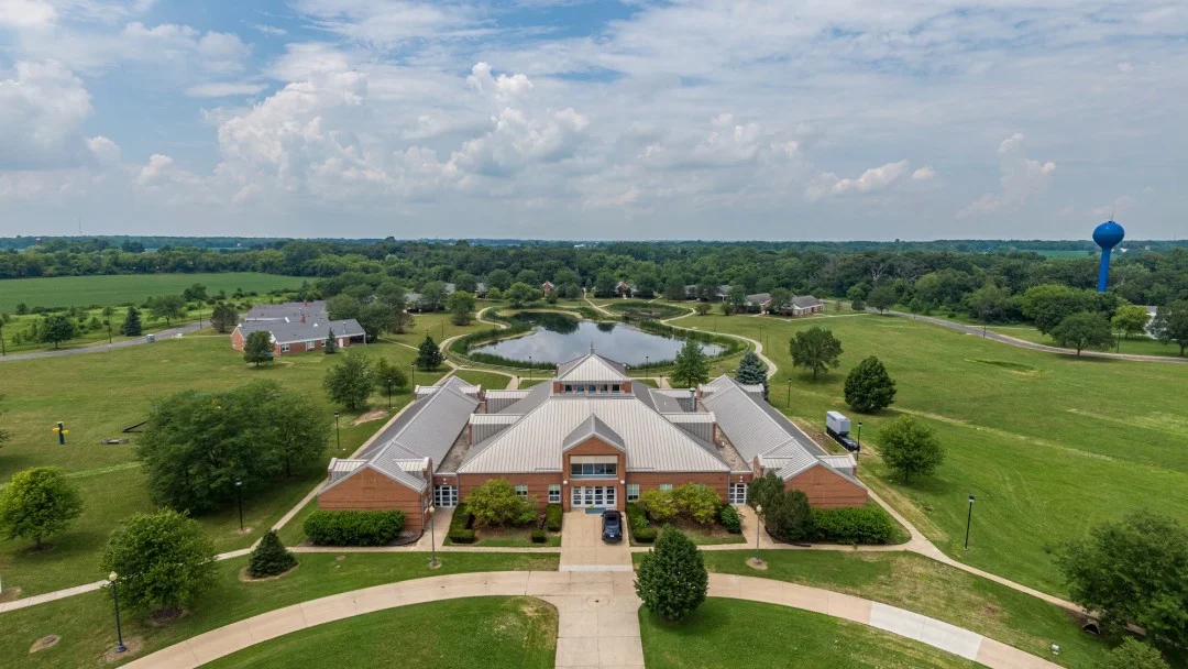 Aerial view of treatment facility surrounded by green grounds