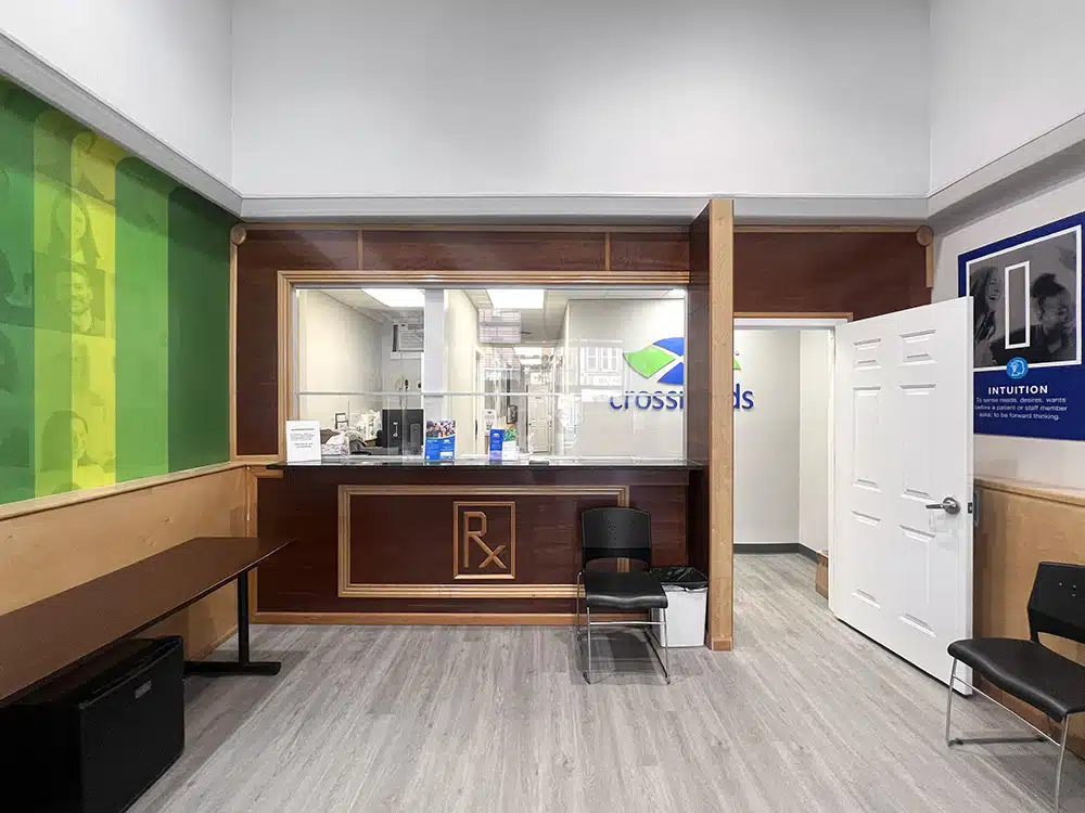 Check-in window with counter and open office doorway