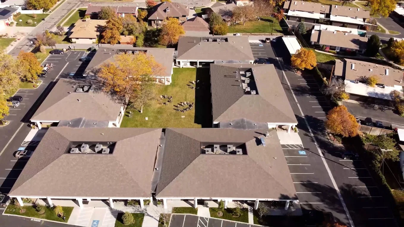 Aerial overview of the Brighton House facility and surrounding Sandy neighborhood
