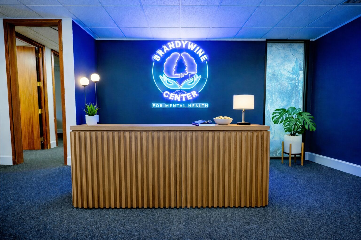 Reception desk with Brandywine Center sign and decor